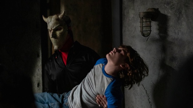 BANNED: A television advertisement for the R16 film The Black Phone, showing children with bloodied faces and a child being abducted and locked in a basement, has been banned.