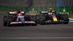 Liam Lawson and Sergio Perez went wheel-to-wheel at the Mexican Grand Prix. Photo / Getty Images