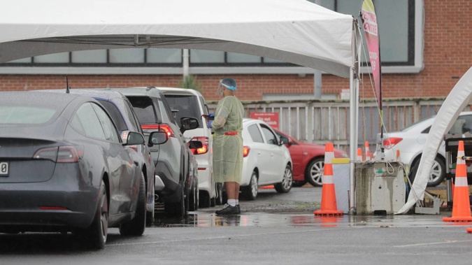 A queue is forming at the Balmoral Community Testing Centre this morning. (Photo / Michael Craig)
