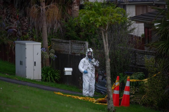 A hazmat unit was in attendance at a West Auckland property tonight after reports of suspicious activity. Photo / Hayden Woodward