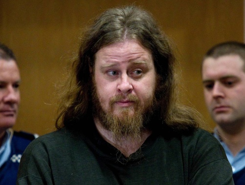 Christopher Smith appears in the Christchurch District Court facing 11 charges including killing a police dog, cultivating cannabis, possession of a weapon, two of using a firearm against a police officer, three charges of possession of an unlicensed firearm and two counts of attempted murder on July 27, 2010. Photo / Simon Baker