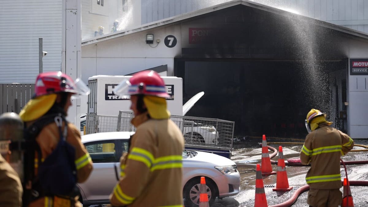 Blaze sends thick black smoke across central Auckland near petrol station