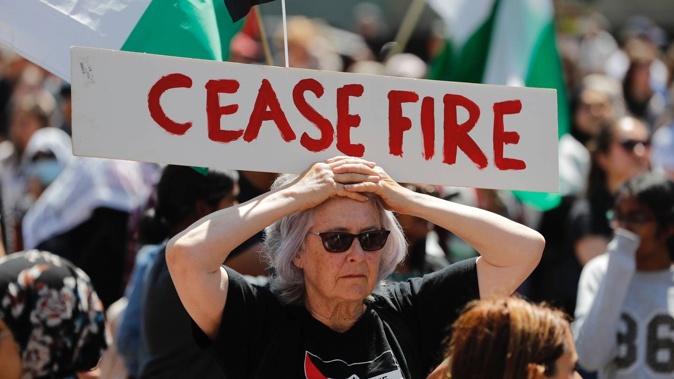 Protesters in Auckland gather for a rally in support of Palestine.