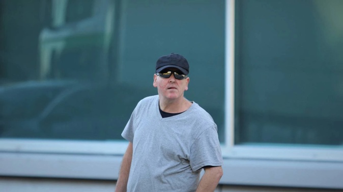 Michael Cruickshank stands outside the North Shore District Court in 2020. (Photo / NZME)