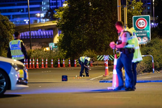 Emergency services cordoned off the Hobson St on-ramp to the Northwestern Motorway last night after a pedestrian was hit by a vehicle in a serious incident. Photo / Hayden Woodward