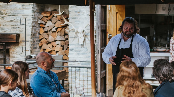 Vaughan Mabee, the executive chef at Amisfield Restaurant in Queenstown talks to diners. Photo / Supplied | Amisfield