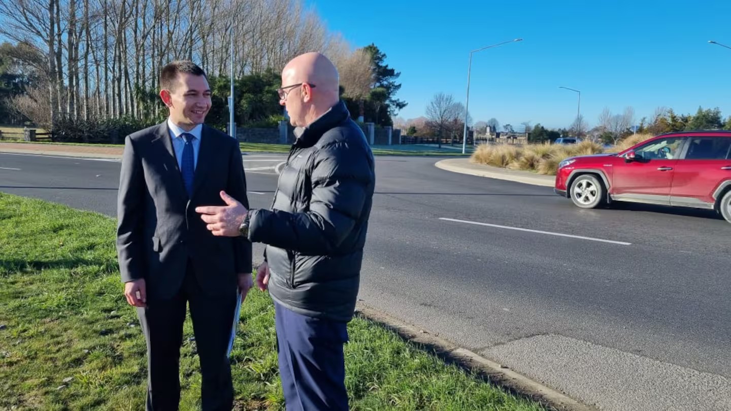 Transport Minister Simeon Brown and Waimakariri MP Matt Doocey at the Pegasus roundabout. Photo / RNZ / Rachel Graham