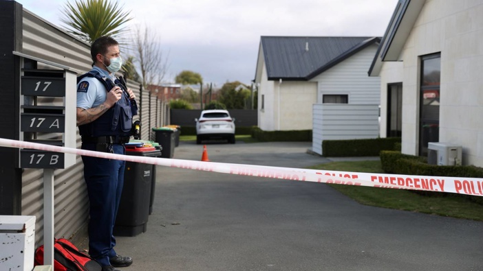 Police stand guard at the scene of the Timaru triple homicide. (Photo / George Heard)