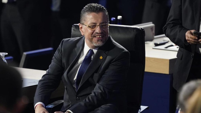 Costa Rica President Rodrigo Chaves Robles smiles during the opening plenary session at the Summit of the Americas on June 9, 2022, in Los Angeles. Robles has declared a state of emergency as the country's tax and customs offices, utilities and other services were taken offline due to cyberattacks. (Photo / AP)