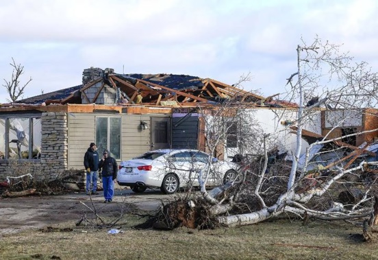 Family members and friends gather at the Rock County, Wisconsin home of Marilyn Kueng. Photo / AP