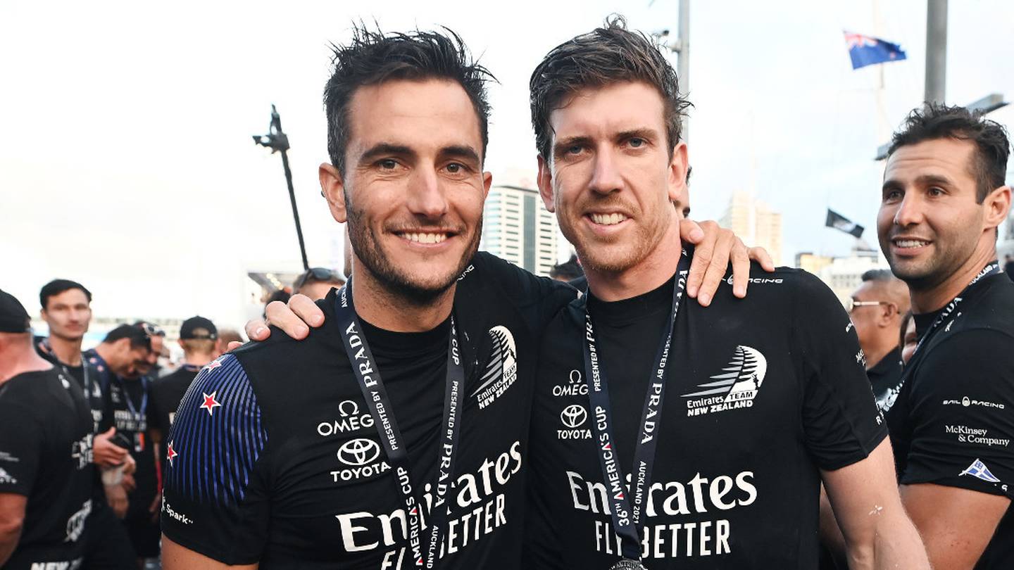 Blair Tuke (L) and Peter Burling after America's Cup victory in Auckland, 2021. (Photo / Photosport)