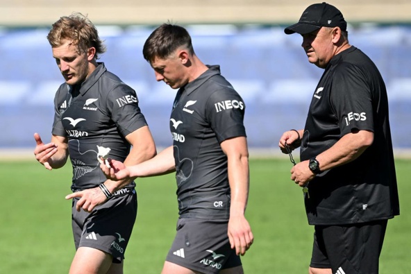 Damian McKenzie and Cam Roigard run through drills during an All Blacks training session in Lyon. Photo / Getty Images