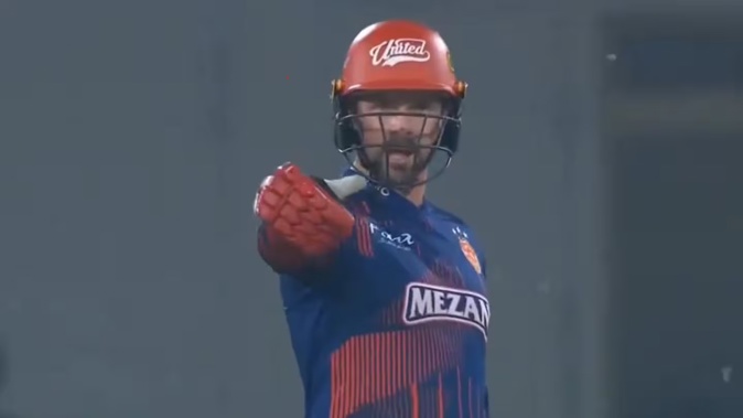 Colin Munro accuses an opponent of chucking. Photo / Pakistan Super League