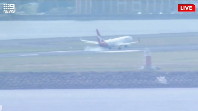 Qantas flight QF144 from Auckland to Sydney lands safely after reported engine failure. Photo / Supplied / 9News