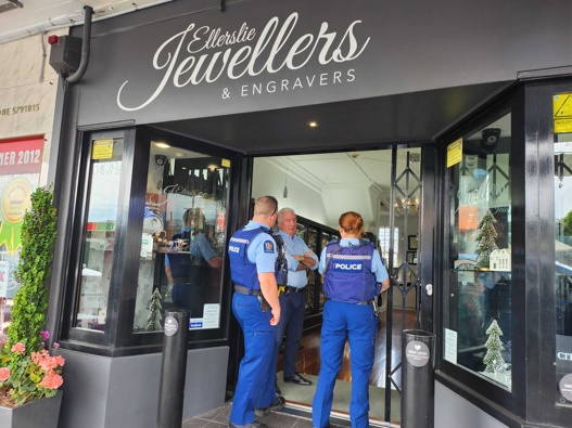 Police officers are investigating the damage done to an Ellerslie Jewellery store today after four hammer-wielding robbers targeted it yesterday afternoon. Photo / Akula Sharma