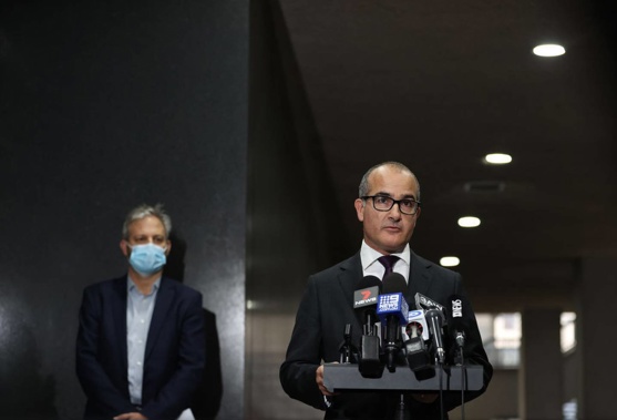 Victoria's chief health officer Professor Brett Sutton and Acting Victorian Premier James Merlino speak to reporters amid the state's latest Covid-19 outbreak. (Photo / AP)