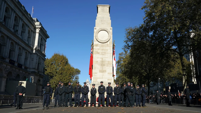 Police gather at the Cenotaph in central London following an Armistice Day remembrance service on Saturday. Jeff Moore/PA/AP