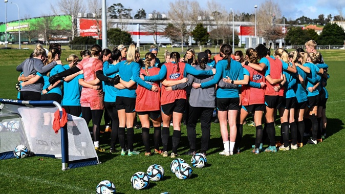 The Football Ferns huddle during a training session. Photo / Photosport