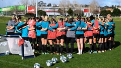 The Football Ferns huddle during a training session. Photo / Photosport