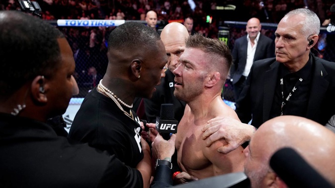Israel Adesanya faces off against Dricus du Plessis after du Plessis stopped Robert Whittaker at UFC 290. Photo / Getty Images