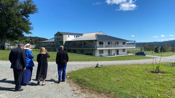 Chief Employment Court Judge Christina Inglis being shown around Gloriavale in February 2023 during the Employment Court case. Photo / Anna Leask, File