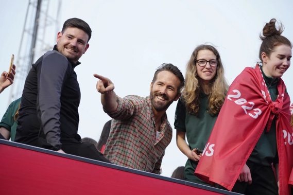 Wrexham co-owner Ryan Reynolds, center, celebrates with members of the Wrexham FC soccer team the promotion to the Football League in Wrexham, Wales, on May 2, 2023. Photo / AP