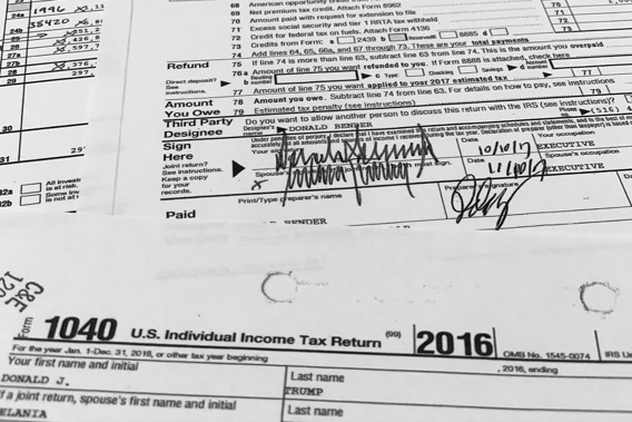 The returns, which include redactions of some personal sensitive information such as Social Security and bank account numbers, span nearly 6,000 pages, including more than 2,700 pages of individual returns, and more than 3,000 pages in returns for Trump's business entities. Photo / AP