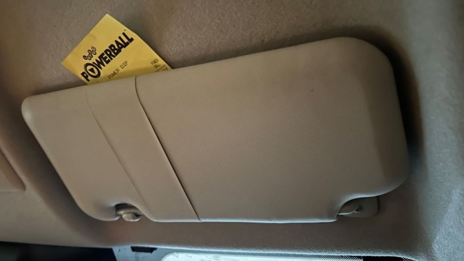 One of the winning families kept their ticket in the sun visor in their car. Photo / Lotto