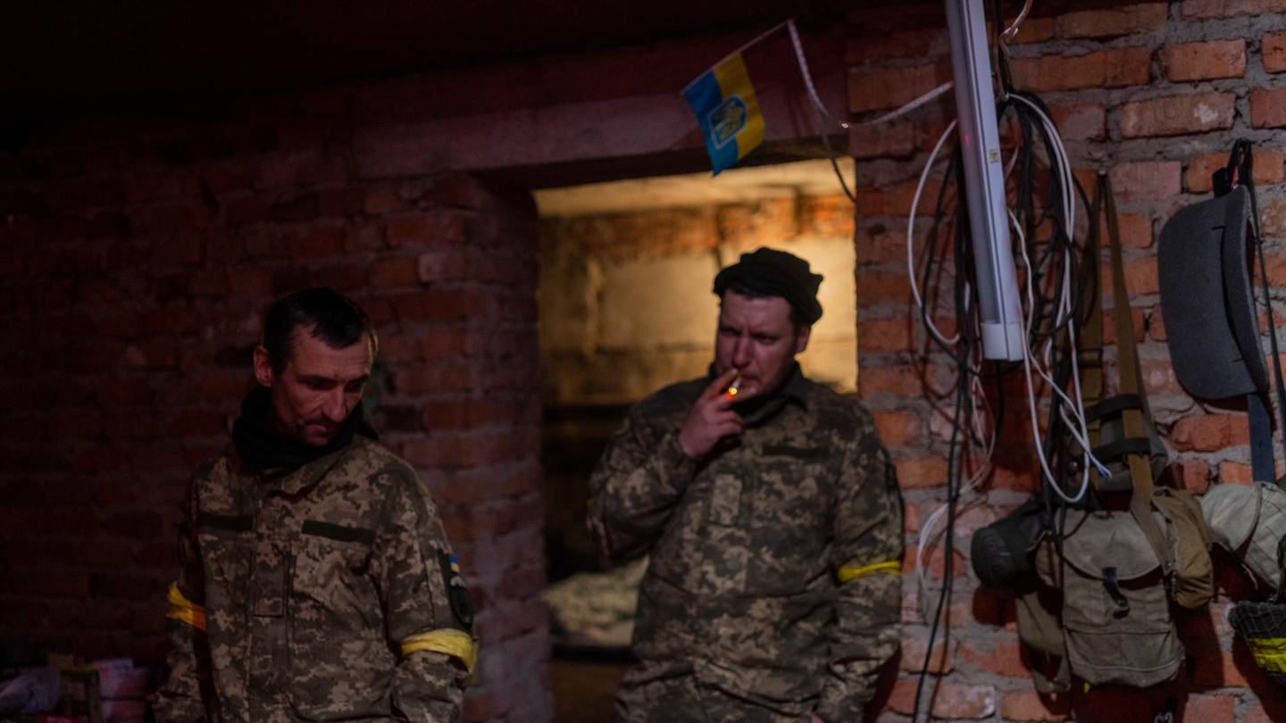 Ukrainian soldiers gather in a basement during a deployment break after returning from the frontline in eastern Kharkiv. Photo / AP