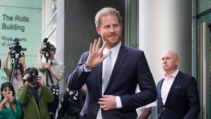 Prince Harry made a fleeting visit to see his sick father. Photo / AP
