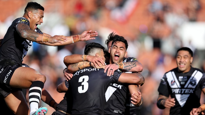 Briton Nikora of New Zealand celebrates a try to Matthew Timoko of New Zealand during the Men's Pacific Championship Final match between Australia Kangaroos and New Zealand Kiwis at Waikato Stadium on November 04, 2023 in Hamilton, New Zealand. (Photo by Phil Walter/Getty Images)