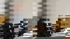 An Auckland businessman accused of assaulting a woman in March 2022 sits in court on the first day of his trial in the Auckland District Court on November 26, 2024. Photo / George Block