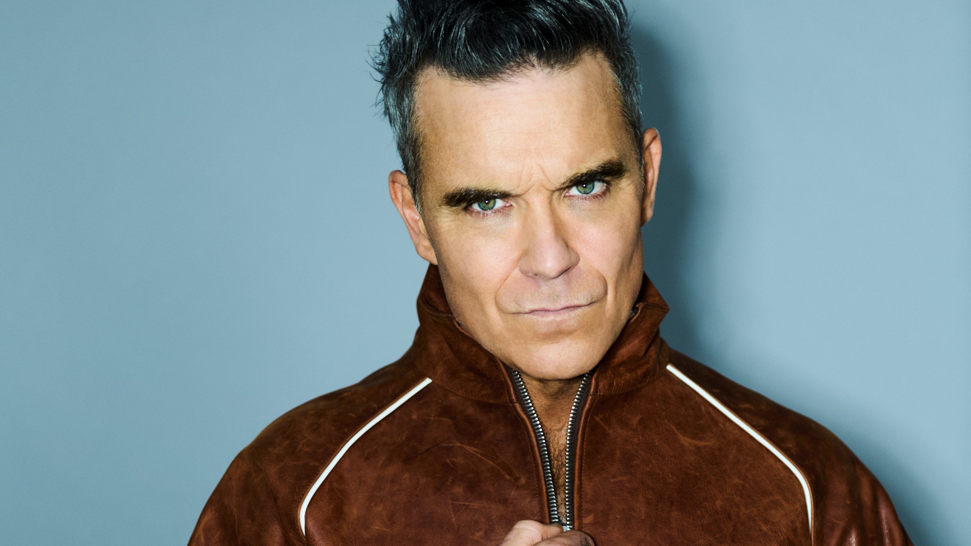 "Mind-bendingly incredible": Robbie Williams talks 16 number one albums, BRITPOP tour 