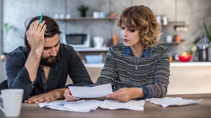 A financial expert says people struggling to stay afloat in a cost-of-living crisis should get rid of their credit cards. Photo / Getty