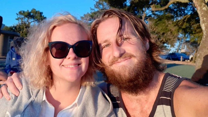 Holly Atkinson, pictured here with her husband Fergus, found out while on a trip in South Africa that she was unable to return to NZ. Photo / Supplied