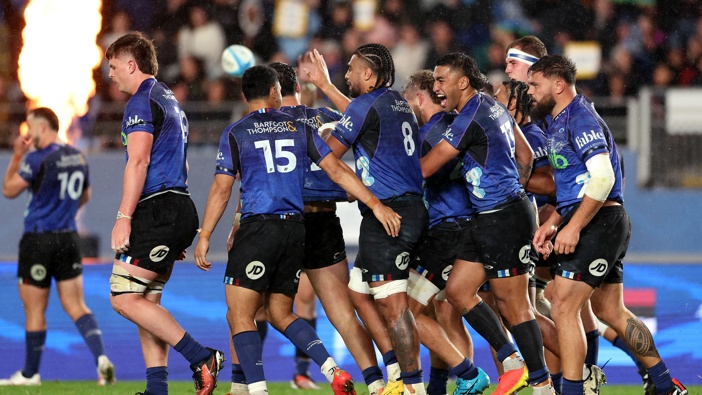 The Blues celebrate a try scored by AJ Lam during the Super Rugby Pacific Grand Final match between Blues and Chiefs at Eden Park, on June 22, 2024, in Auckland, New Zealand. (Photo by Phil Walter/Getty Images)