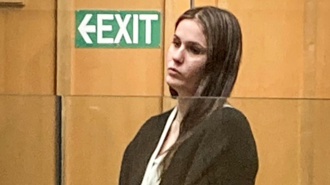 Jessica Mulford in the dock of the High Court at Hamilton where she is defending charges of injuring with intent to injure and murder of 2-year-old Harlee-Rose Niven in Hamilton on April 9, 2022. Photo / Belinda Feek
