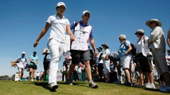Guy Wilson and Lydia Ko were a familiar sight on golf courses for over 10 years. Photo / Photosport
