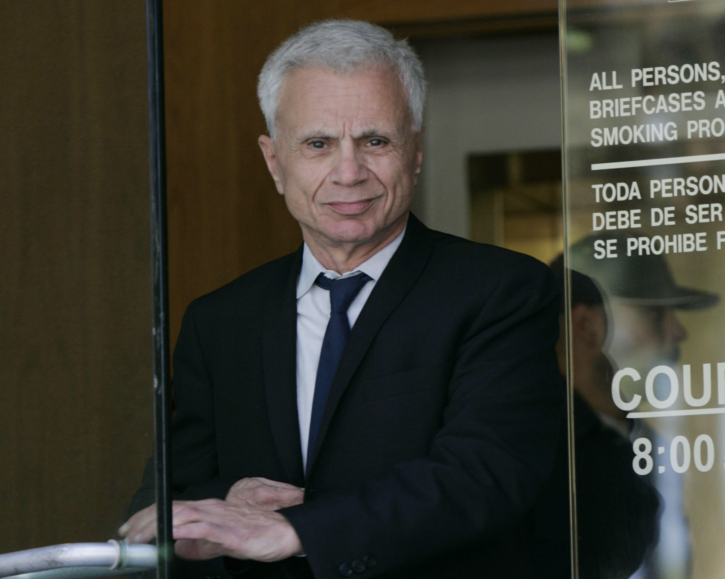 Actor Robert Blake leaves court for the lunch break, Oct. 3, 2005, after his second day of testimony in a wrongful death lawsuit, brought by the family of Bonny Lee Bakley, in Burbank, Calif. Blake, the Emmy award-winning performer who went from acclaim for his acting to notoriety when he was tried and acquitted of murdering his wife, died Thursday, March 9, 2023, at age 89. Photo / AP