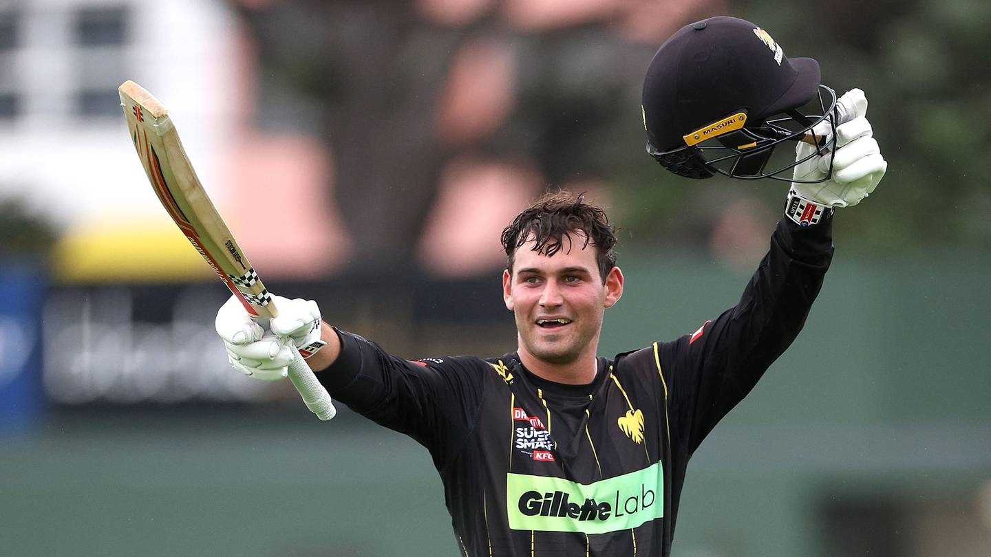 Tim Robinson celebrates his century against Otago. Photo / Photosport