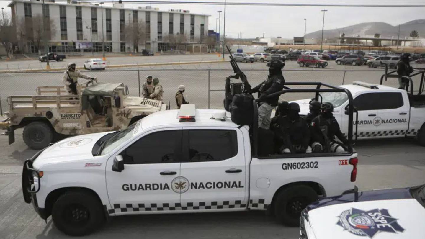 Mexican National Guard stand guard outside a state prison in Ciudad Juárez. Photo / AP