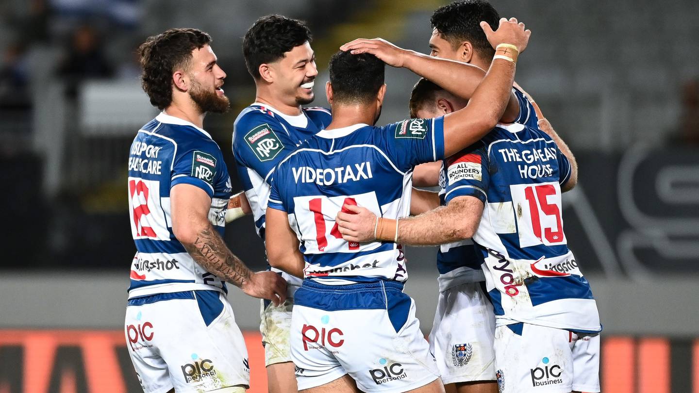 Salesi Rayasi of Auckland celebrates a try with teammates. Photo / Photosport