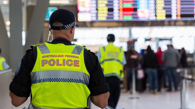 A 44-year-old woman allegedly assaulted crew on a flight to Sydney before assaulting two AFP officers as they attempted to remove her upon arrival. Photo / Getty Images