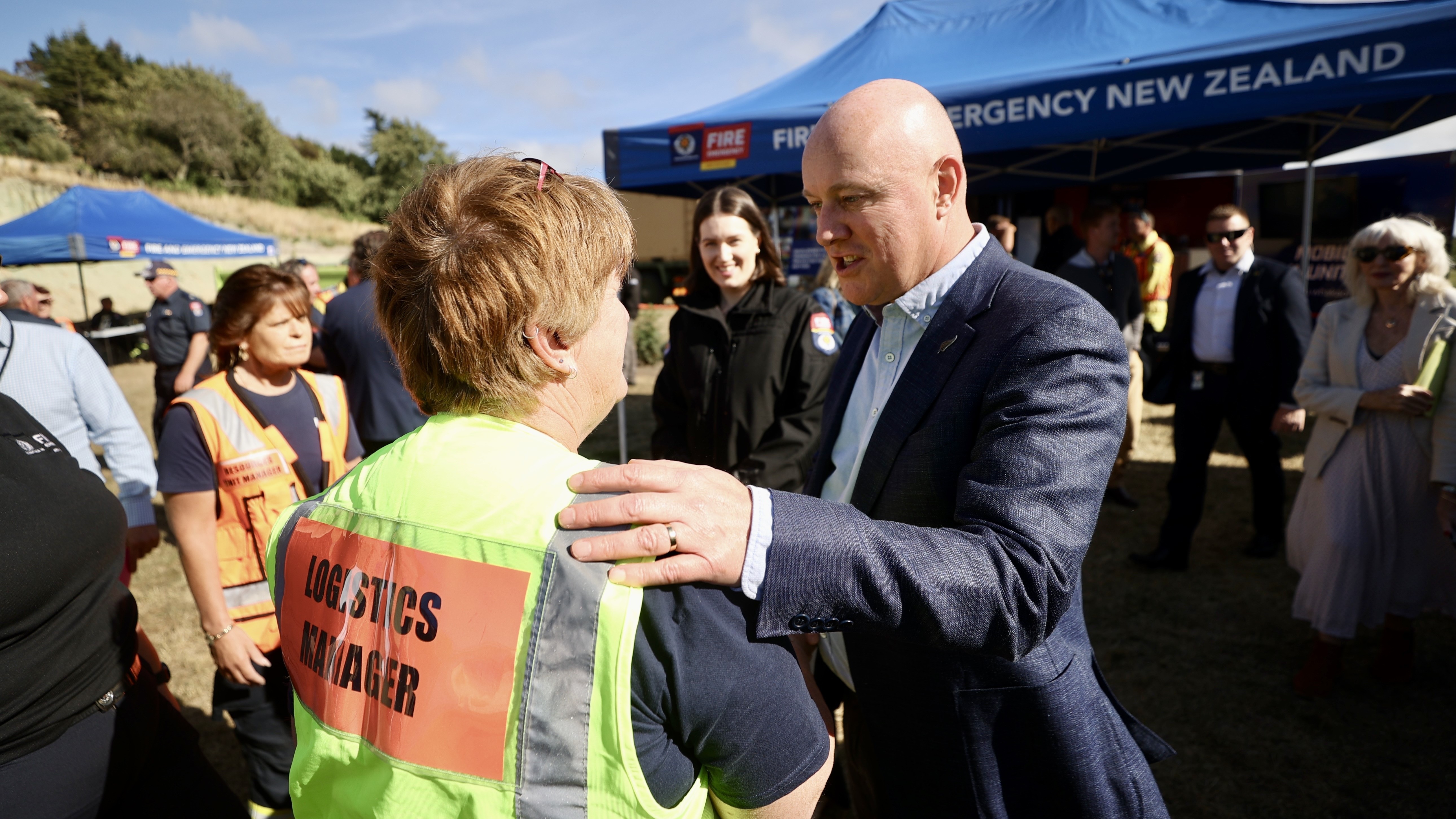 Prime Minister Christopher Luxon visits the Port Hills fire grounds on Thursday morning. Photo / George Heard