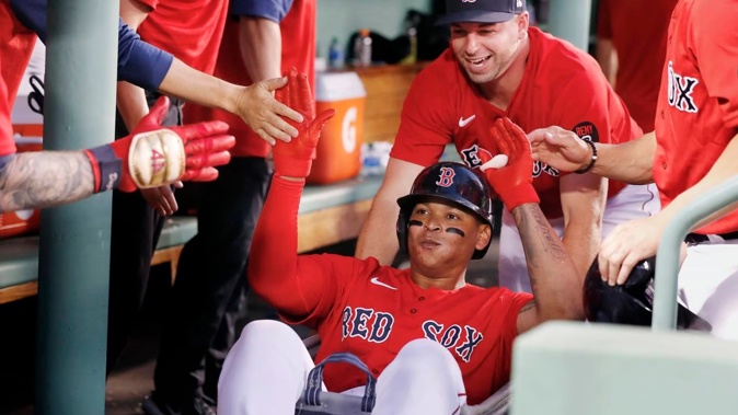 Boston Red Sox's Rafael Devers celebrates a home run. Photo / AP