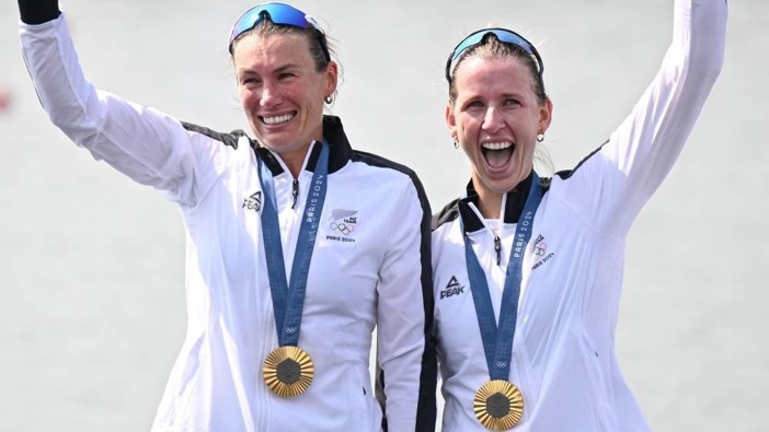 Lucy Spoors and Brooke Francis celebrate Olympic gold in Paris. Photo / Photosport