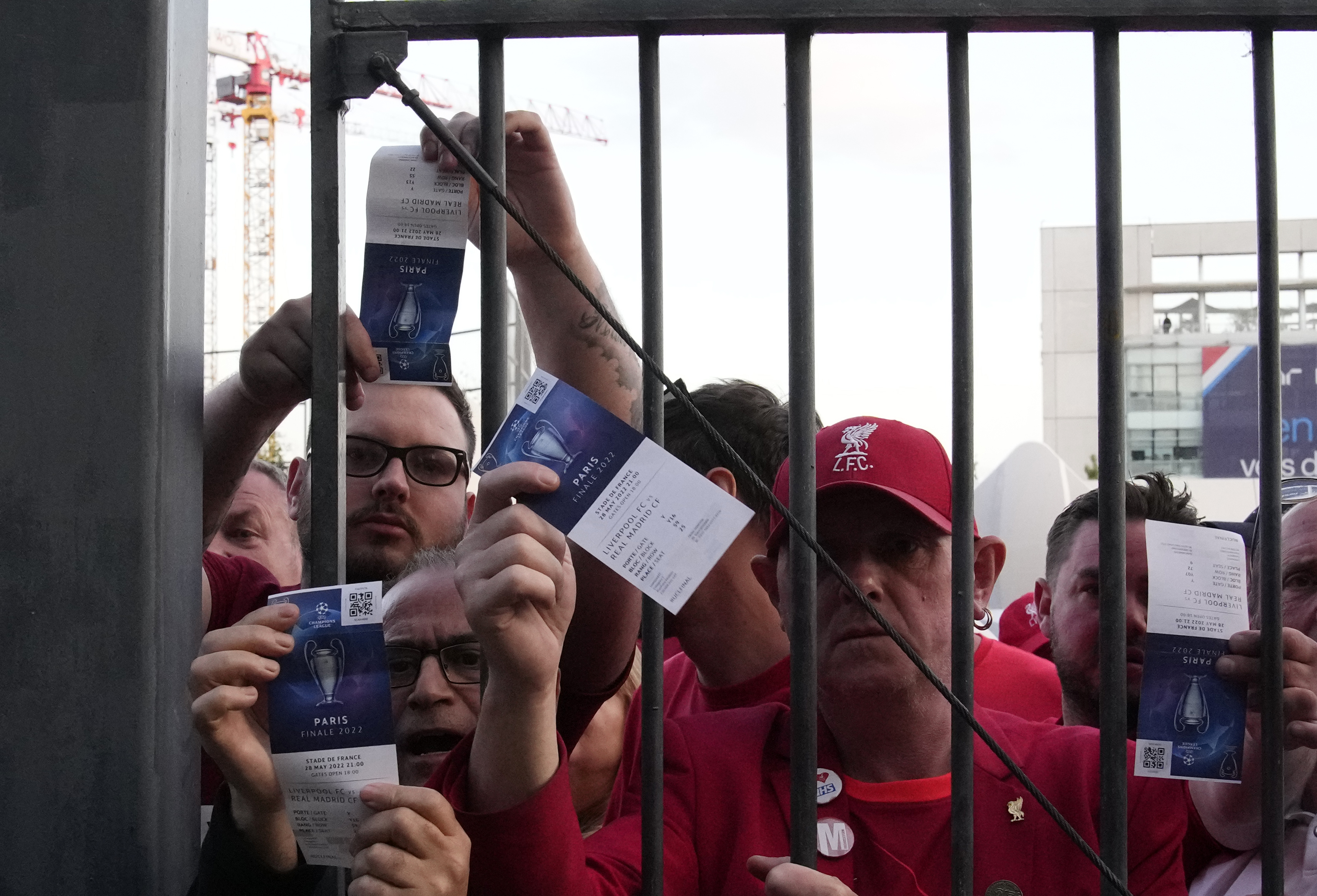 Fans shows tickets in front of the Stade de France prior the Champions League final soccer match between Liverpool and Real Madrid, in Saint Denis near Paris, Saturday, May 28, 2022. Photo / AP