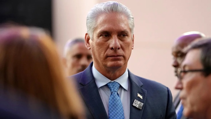 Cuba President Miguel Diaz-Canel walks through the COP28 U.N. Climate Summit in December, 2023 in Dubai. Peter Dejong/AP/FILE