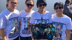 Ngawai Himiona's sisters and mother, Donna Rikirangi (second from right) hold the ashes of their daughter and sister outside the High Court at Hamilton. (Photo / Belinda Feek)