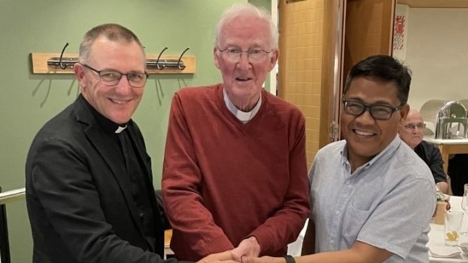Father Geoffrey Gray (centre) in December 2022 as he celebrated the 50th anniversary of his Ordination to Priesthood. He was found dead by a concerned neighbour on the grounds of the Akaroa parish on November 29, 2024. Photo / Catholic Diocese